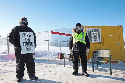 11122024
Letter Carrier Chad Azure and Rural &amp; Suburban Mail Carrier Milt Kwiatkowski with Canada Post picket in the freezing colds outside Canada Post&#x2019;s Brandon mail processing plant on Douglas Street along with other striking Canadian Union of Postal Workers members on Wednesday. It has been four weeks since approximately 55,000 postal workers represented by the Canadian Union of Postal Workers went on strike across Canada after unsuccessful negotiations with their employer.
(Tim Smith/The Brandon Sun)11122024
Letter Carrier Chad Azure and Rural &amp; Suburban Mail Carrier Milt Kwiatkowski with Canada Post picket in the freezing colds outside Canada Post&#x2019;s Brandon mail processing plant on Douglas Street along with other striking Canadian Union of Postal Workers members on Wednesday. It has been four weeks since approximately 55,000 postal workers represented by the Canadian Union of Postal Workers went on strike across Canada after unsuccessful negotiations with their employer.
(Tim Smith/The Brandon Sun)