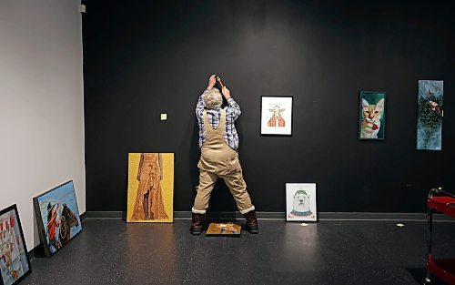 11122024
Kevin Conlin, Managing Director for the Art Gallery of Southwestern Manitoba, hangs some of the art work for the 20th Annual Members&#x2019; Show on Wednesday. The Members&#x2019; Show opens tonight in the AGSM Main Gallery alongside the opening reception for Tara Leach&#x2019;s exhibition The Eternal Question in the AGSM Kayes Community Gallery. Leach&#x2019;s exhibition opened on November 7 and runs until February 12, 2025. The Members&#x2019; Show runs until January 11, 2025.
(Tim Smith/The Brandon Sun)