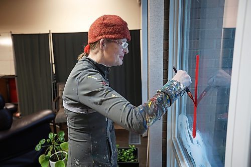 11122024
Brandon artist Anne Boychuk works on a Christmas themed window mural for Extendicare Hillcrest Place in Brandon on Wednesday afternoon. Boychuk&#x2019;s window murals can be spotted throughout the wheat city. On Friday morning Boychuk will be leading grades 11 and 12 painting students at Crocus Plains Regional Secondary School in painting window murals at the school.   (Tim Smith/The Brandon Sun)