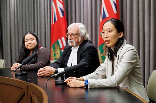 MIKE DEAL / FREE PRESS 
The Honourable Tom Lindsey, Speaker of the Legislative Assembly of Manitoba, with Youth Parliament members, Josephine Zhao (right), speaker, and Jourmae Abengoza (left), house leader, of the 103rd Session of the Youth Parliament of Manitoba during their annual press conference Thursday afternoon. 
241212 - Thursday, December 12, 2024.