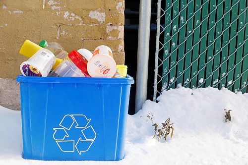 MIKE DEAL / FREE PRESS illustration 
A blue bin overflowing with plastic recyclables.
241212 - Thursday, December 12, 2024.