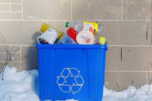 MIKE DEAL / FREE PRESS illustration 
A blue bin overflowing with plastic recyclables.
241212 - Thursday, December 12, 2024.