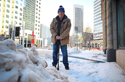 RUTH BONNEVILLE / FREE PRESS
Local - snow clearing
Photo of David Kron, executive director, Cerebral Palsy Association of Manitoba outside near the office building he works in.
David Kron has serious concerns that folks could be stuck in their homes is the city moves to a higher accumulation to clear residential streets. He uses a cane and manual wheelchair to get around.
Dec 12th, 2024