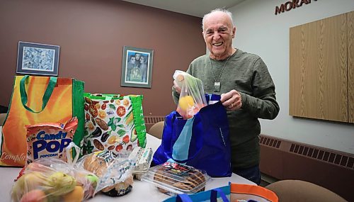RUTH BONNEVILLE / FREE PRESS
Volunteer Column
Photo of Barry Weber as he packs hampers at the Jewish Community Centre Thursday.
Subject: Barry Weber, volunteer with the Hanukkah food program organized by B'nai Brith Canada and Jewish Child and Family Service. Volunteers package and deliver parcels to some of the Jewish communityճ most vulnerable members, including seniors, Holocaust survivors, widows and widowers, and individuals with disabilities.
This is for my Dec. 16 volunteers column.
See story by Aaron
Dec 12th, 2024