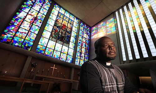 RUTH BONNEVILLE / FREE PRESS

FAITH - Blue Christmas

Portrait of Rev. Sherpard Gwende, St. George's Anglican Church, with the brilliant blue hues of the stain glassed windows in the main sanctuary behind him.  He holds a Blue Christmas service at his church for those who miss loved ones, especially at this time of year.  

John Longhurst story

Dec 13th, 2024