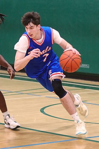 Riffel's Ethan Aveyard dribbles up court before hitting the game winning shot in the Victoria Inn Division final. (Matt Packwood/The Brandon Sun)