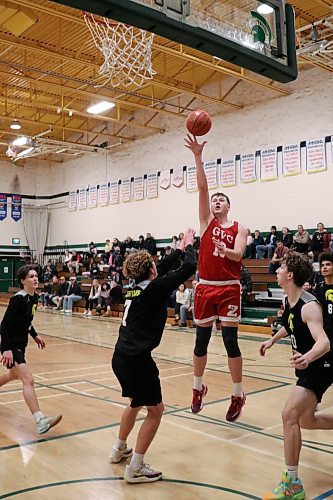 Source for Sports division tournament MVP Ethan Wiebe of Garden Valley takes a shot over Neelin's Owen Falk in the final. (Matt Packwood/The Brandon Sun)