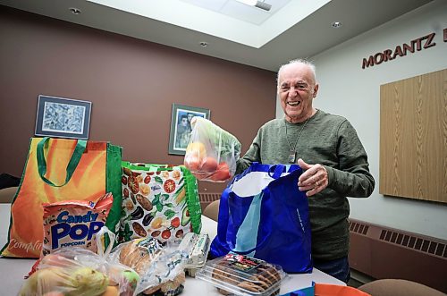 RUTH BONNEVILLE / FREE PRESS
Volunteer Column
Photo of Barry Weber as he packs hampers at the Jewish Community Centre Thursday.
Subject: Barry Weber, volunteer with the Hanukkah food program organized by B'nai Brith Canada and Jewish Child and Family Service. Volunteers package and deliver parcels to some of the Jewish communityճ most vulnerable members, including seniors, Holocaust survivors, widows and widowers, and individuals with disabilities.
This is for my Dec. 16 volunteers column.
See story by Aaron
Dec 12th, 2024