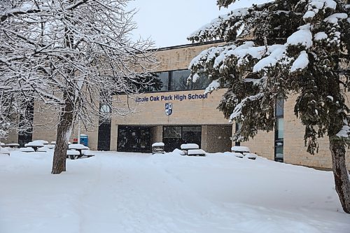 MIKE DEAL / FREE PRESS
Ecole Oak Park High School is one of two schools in Winnipeg that have cancelled classes after receiving threats via email Sunday evening. 
The closed school has &#x201c;School is closed&#x201d; signs taped to its entrances. 
241216 - Monday, December 16, 2024. 