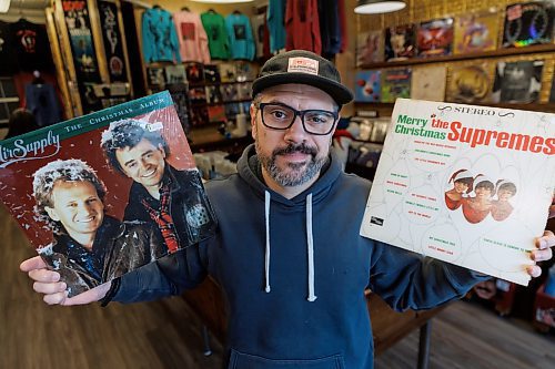 MIKE DEAL / FREE PRESS
Brent Jackson, Old Gold Vintage Vinyl (187 Osborne St.) with albums by Air Supply and The Supremes.
Reporter Dave Sanderson polled the owners of the city's new-and-used record shops, to find out what their fave Christmas tunes are, what customers are looking for and what they've currently go in stock, Christmas-wise.
241216 - Monday, December 16, 2024.