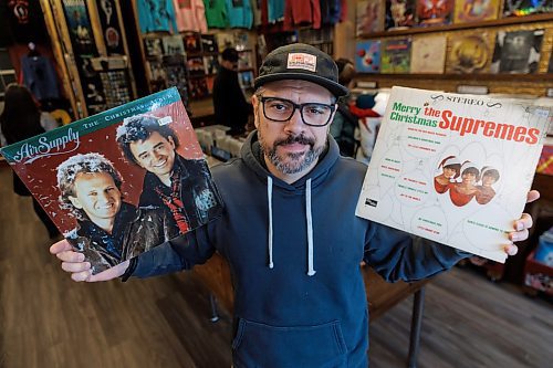 MIKE DEAL / FREE PRESS
Brent Jackson, Old Gold Vintage Vinyl (187 Osborne St.) with albums by Air Supply and The Supremes.
Reporter Dave Sanderson polled the owners of the city's new-and-used record shops, to find out what their fave Christmas tunes are, what customers are looking for and what they've currently go in stock, Christmas-wise.
241216 - Monday, December 16, 2024.