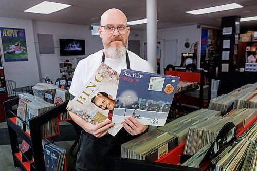 MIKE DEAL / FREE PRESS
Ryan French, Frenchie's Records (260 Tache Ave) with albums by Bing Crosby and Ben Folds.
Reporter Dave Sanderson polled the owners of the city's new-and-used record shops, to find out what their fave Christmas tunes are, what customers are looking for and what they've currently go in stock, Christmas-wise.
241216 - Monday, December 16, 2024.