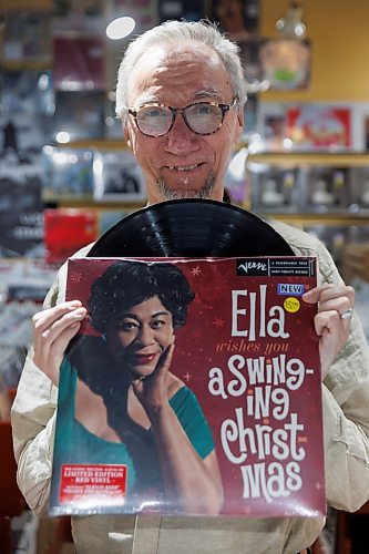 MIKE DEAL / FREE PRESS
Greg Tonn, Into the Music (245 McDermot Ave.) with an album by Ella Fitzgerald, Ella wishes you a Swinging Christmas.
Reporter Dave Sanderson polled the owners of the city's new-and-used record shops, to find out what their fave Christmas tunes are, what customers are looking for and what they've currently go in stock, Christmas-wise.
241216 - Monday, December 16, 2024.