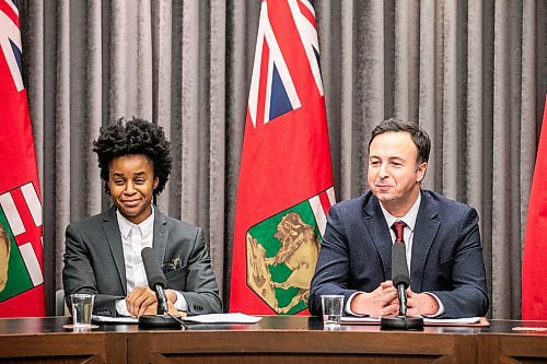 MIKAELA MACKENZIE / FREE PRESS
	
Health minister Uzoma Asagwara (left) and finance minister Adrien Sala give a provincial fiscal update at the Manitoba Legislative Building on Monday, Dec. 16, 2024.

For Maggie story.
Winnipeg Free Press 2024