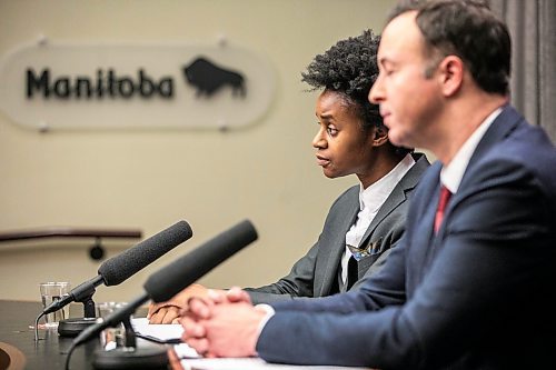 MIKAELA MACKENZIE / FREE PRESS
	
Health minister Uzoma Asagwara (left) and finance minister Adrien Sala give a provincial fiscal update at the Manitoba Legislative Building on Monday, Dec. 16, 2024.

For Maggie story.
Winnipeg Free Press 2024