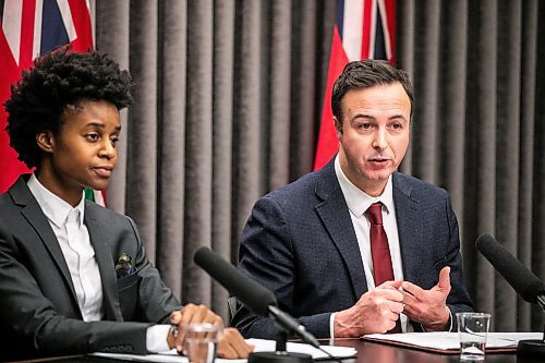 MIKAELA MACKENZIE / FREE PRESS
	
Health minister Uzoma Asagwara (left) and finance minister Adrien Sala give a provincial fiscal update at the Manitoba Legislative Building on Monday, Dec. 16, 2024.

For Maggie story.
Winnipeg Free Press 2024