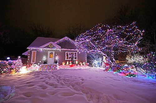 A residence at 522 22nd Street sports a beautiful array of holiday lights on Monday evening. The display is meant to help raise funds for One At A Time Rescue, a Brandon-based organization that focuses primarily on orphaned animals. Owner Patrick Stewart has worked since November to ready the holiday light display for the fundraiser.  (Matt Goerzen/The Brandon Sun)