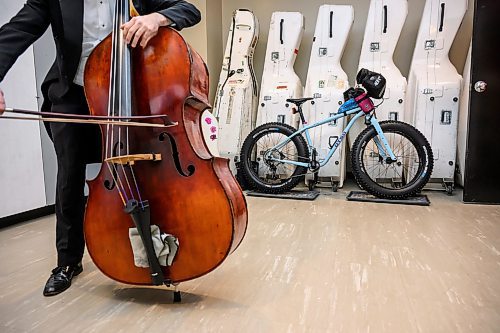 MIKE SUDOMA / FREE PRESS
A Winnipeg Symphony Orchestra performer tunes up their instrument as Perrys bicycle is parked in the background
Nov 30, 2024




