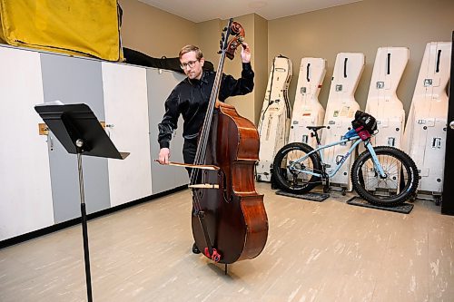 MIKE SUDOMA / FREE PRESS
Daniel Perry tunes up his bass minutes prior to hitting the stage for a 730pm Winnipeg Symphony Orchestra performance Saturday evening 
Nov 30, 2024




