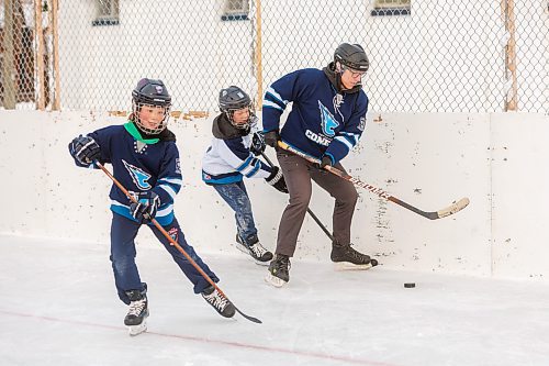 MIKE DEAL / FREE PRESS
Mayor Scott Gillingham tries to keep a puck away from Matthew, 9, on one of the rinks at the Corydon Community Centre &#x2013; Sir John Franklin site (1 Sir John Franklin Rd.) after announcing that thirteen City-owned community centres will receive funding for renovations through the City of Winnipeg&#x2019;s Community Centre Renovation Grant Program (CCRGP).
Standup
241217 - Tuesday, December 17, 2024.