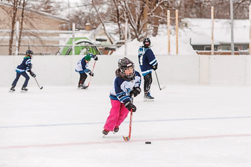 MIKE DEAL / FREE PRESS
Ashtyn, 7, stickhandles a puck while skating on one of the rinks at the Corydon Community Centre &#x2013; Sir John Franklin site (1 Sir John Franklin Rd.) where the mayor announced that thirteen City-owned community centres will receive funding for renovations through the City of Winnipeg&#x2019;s Community Centre Renovation Grant Program (CCRGP).
Standup
241217 - Tuesday, December 17, 2024.