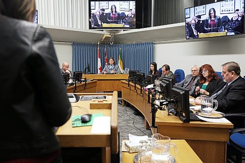 Brandon's mayor Jeff Fawcett listens to Lois Ruston, president of the Brandon Chamber of Commerce as she addresses Brandon City Councillors duirng a public hearing Monday evening in council chambers. Ruston has concerns about proposed changes to a city bylaw involving Development Cost Charges. (Michele McDougall/The Brandon Sun) 