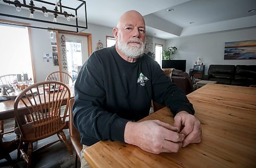 JOHN WOODS / FREE PRESS
Mervin Friesen, a Niverville resident whose mum has been waiting in Morris General Hospital for a personal care home (PCH) bed for four months, is photographed in his home Tuesday, December 17, 2024. Rural care homes often face a lack of capacity - either short beds, short staff or both.

Reporter: gabby