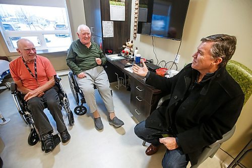 JOHN WOODS / FREE PRESS
Niverville&#x2019;s mayor Myron Dyck is photographed with residents Wilhelm Funk, centre, and David Sawatzky, left, at the Heritage Life Personal Care Home Tuesday, December 17, 2024. Rural care homes often face a lack of capacity - either short beds, short staff or both.

Reporter: gabby