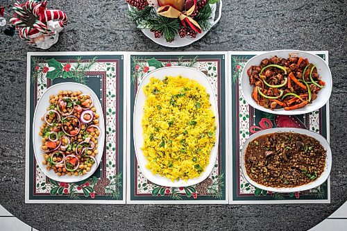 MIKAELA MACKENZIE / FREE PRESS
	
Chickpea salad (left), Manchurian soya (top right), and lentils with mushrooms (bottom right), served with basmati rice, on Monday, Dec. 9, 2024. These are all options for plant-based proteins in holiday meals.

For Romona story.
Winnipeg Free Press 2024