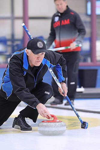 Terry Warren delivers a rock in the Westoba Credit Union Masters Super League final Wednesday afternoon at the Brandon Curling Club. (Matt Packwood/The Brandon Sun)