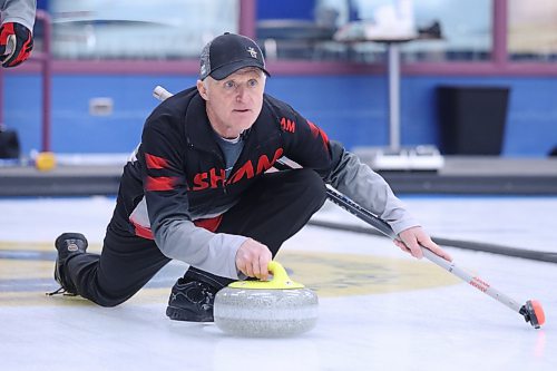 Morley Walker of Portage delivers a rock in the Westoba Credit Union Masters Super League Final Wednesday afternoon at the Brandon Curling Club. (Matt Packwood/The Brandon Sun)