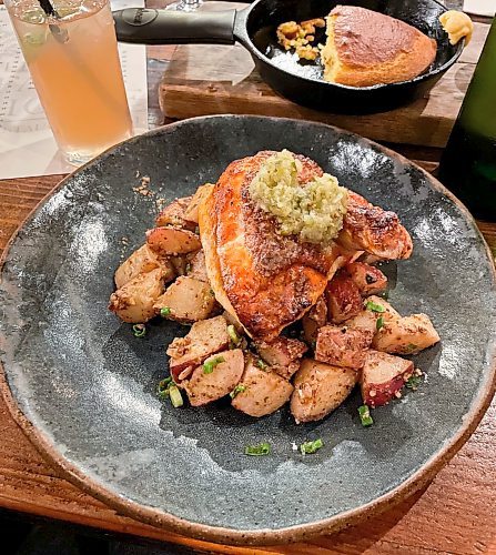 EVA WASNEY / FREE PRESS
The Farm House's hot chicken, served with tangy pickle relish, is a dish to remember. 