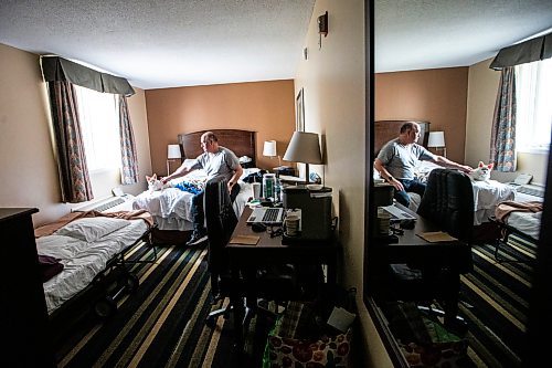 MIKAELA MACKENZIE / FREE PRESS

Des Kappel, displaced resident from Birchwood Terrace, with his dog Nemo in the hotel room they are currently staying in on Wednesday, May 15, 2024. 

For Tyler story.

