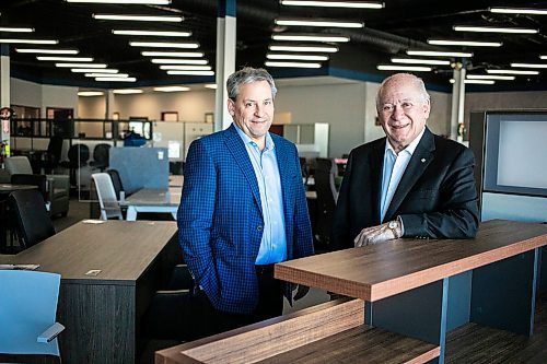 MIKAELA MACKENZIE / FREE PRESS
	
Rob Cunningham, president (left), and Bob Cunningham, founder and CEO, at Cunningham Business Interiors, which has offered customizable furnishing options for businesses and home offices since 1964, on Wednesday, Dec. 18, 2024.

For Aaron Epp story.
Winnipeg Free Press 2024