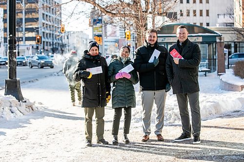 MIKAELA MACKENZIE / FREE PRESS
	
Steve Bagel (left), Elena Anciro, Matthew Samyn, and Brandon Boone get ready to hand-deliver a thank-you note to IG Wealth Management on Wednesday, Dec. 18, 2024.

For Koralee story.
Winnipeg Free Press 2024