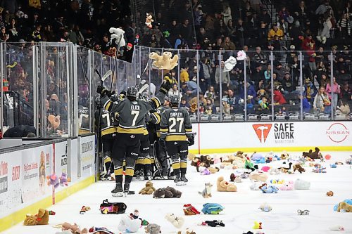 07122024
The Brandon Wheat Kings celebrate the Teddy Bear Toss goal as stuffed animals rain down on the ice during the first period of WHL action against the Prince Albert Raiders at Westoba Place on Saturday evening. The stuffed animals and other items are collected for Brandon-Westman Christmas Cheer. 
(Tim Smith/The Brandon Sun)