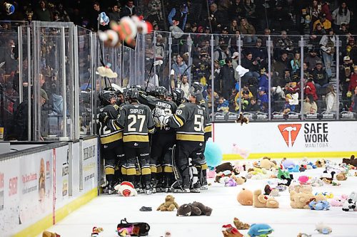 07122024
The Brandon Wheat Kings celebrate the Teddy Bear Toss goal as stuffed animals rain down on the ice during the first period of WHL action against the Prince Albert Raiders at Westoba Place on Saturday evening. The stuffed animals and other items are collected for Brandon-Westman Christmas Cheer. 
(Tim Smith/The Brandon Sun)