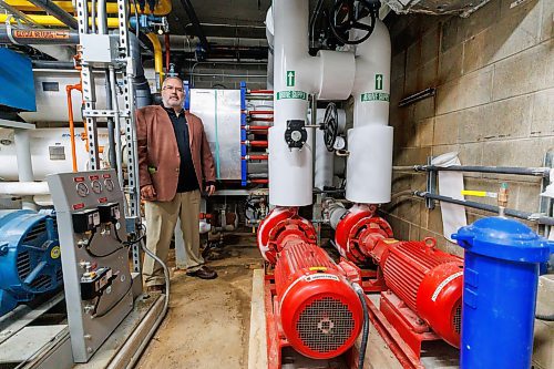 MIKE DEAL / FREE PRESS
J. Brian Blahey in the engine room at the Dakota Fieldhouse (1188 Dakota St) where he was the prime consultant on a complete engine room and ice plant refrigeration replacement.
J. Brian Blahey, runs JBB Consultants and Engineers, Inc., a one-man firm with a variety of professional design, engineering, construction and management experience. 
241219 - Thursday, December 19, 2024.