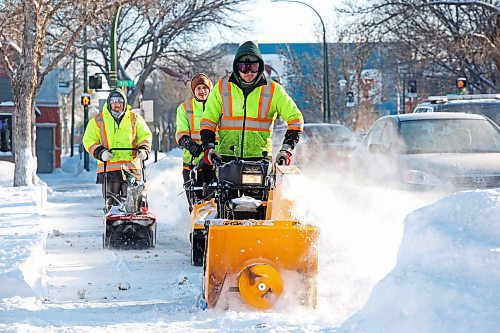 19122024
City of Brandon workers clear big snowdrifts from the sidewalk along Princess Avenue in downtown Brandon after yet another big overnight snowfall on Thursday.
(Tim Smith/The Brandon Sun)