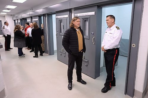 19122024
Brandon Mayor Jeff Fawcett chats with Brandon Police Service Chief Tyler Bates while touring the new detention cells at the Brandon Police Service headquarters in Brandon on Thursday. (Tim Smith/The Brandon Sun)