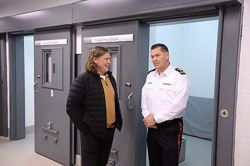 19122024
Brandon Mayor Jeff Fawcett chats with Brandon Police Service Chief Tyler Bates while touring the new detention cells at the Brandon Police Service headquarters in Brandon on Thursday. (Tim Smith/The Brandon Sun)