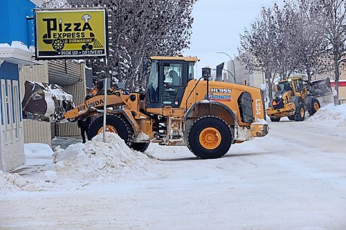 Street clearing continued on 10th Street in the late morning on Friday as a crew from Alternative Excavation worked to clear snow obstructions along the road and sidewalk. (Matt Goerzen/The Brandon Sun)