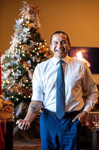 MIKAELA MACKENZIE / FREE PRESS
	
Premier Wab Kinew shows off his distinctly Manitoban new tattoo in his office on Friday, Dec. 20, 2024.

For Maggie story.
Winnipeg Free Press 2024