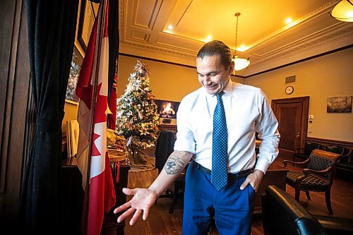 MIKAELA MACKENZIE / FREE PRESS
	
Premier Wab Kinew shows off his distinctly Manitoban new tattoo in his office on Friday, Dec. 20, 2024.

For Maggie story.
Winnipeg Free Press 2024