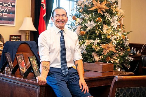 MIKAELA MACKENZIE / FREE PRESS
	
Premier Wab Kinew shows off his distinctly Manitoban new tattoo in his office on Friday, Dec. 20, 2024.

For Maggie story.
Winnipeg Free Press 2024