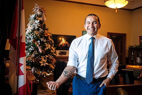 MIKAELA MACKENZIE / FREE PRESS
	
Premier Wab Kinew shows off his distinctly Manitoban new tattoo in his office on Friday, Dec. 20, 2024.

For Maggie story.
Winnipeg Free Press 2024