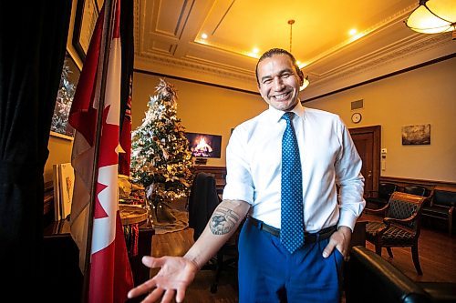 MIKAELA MACKENZIE / FREE PRESS
	
Premier Wab Kinew shows off his distinctly Manitoban new tattoo in his office on Friday, Dec. 20, 2024.

For Maggie story.
Winnipeg Free Press 2024