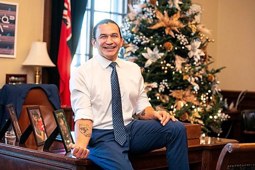 MIKAELA MACKENZIE / FREE PRESS
	
Premier Wab Kinew shows off his distinctly Manitoban new tattoo in his office on Friday, Dec. 20, 2024.

For Maggie story.
Winnipeg Free Press 2024