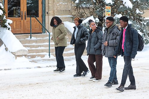 Brandon University International students Tolu Oke, Jessica Ehirim, Rejoice Ifeuwa, Goodness Ibeh, and Tosin Salau walk in front of Clark Hall toward the Knowles Douglas Building on Saturday. BU is grappling with the fallout from a decline in international student enrolment, a trend reverberating across Canada in the wake of recent federal policy changes. (Abiola Odutola/The Brandon Sun)