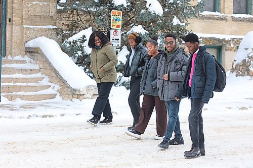 Brandon University International students Tolu Oke, Jessica Ehirim, Rejoice Ifeuwa, Goodness Ibeh, and Tosin Salau walk in front of Clark Hall toward the Knowles Douglas Building on Saturday. BU is grappling with the fallout from a decline in international student enrolment, a trend reverberating across Canada in the wake of recent federal policy changes. (Abiola Odutola/The Brandon Sun)